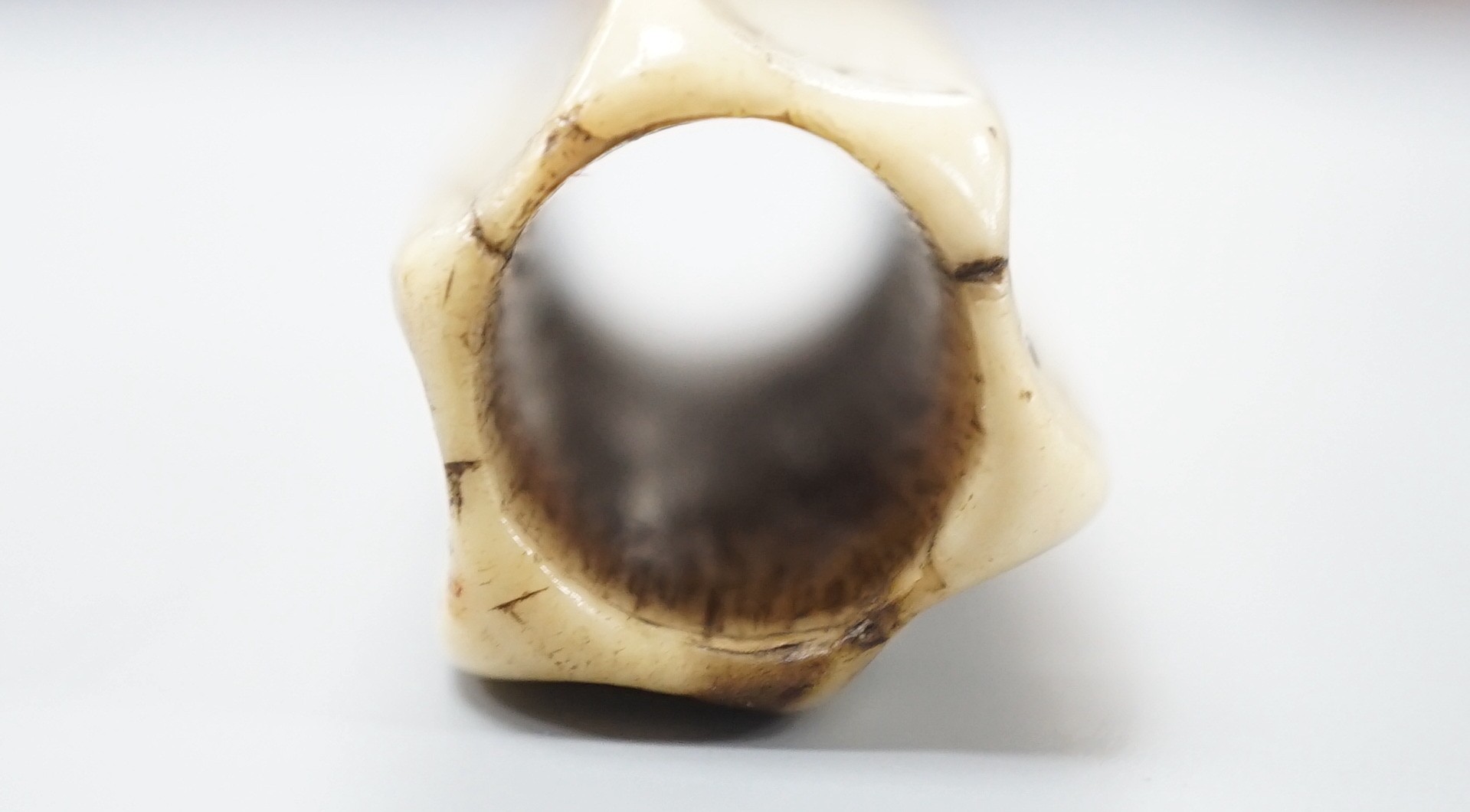An early European bone six sided long dice, 6.8cm, cf. a similar example in the British Museum No. 1871,0910.2